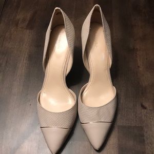 Calvin Klein faux snake skin pumps.